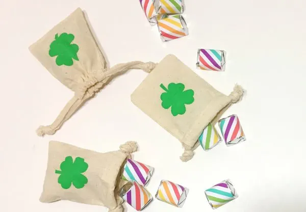 FullSizeRender 346 St. Patrick's Day Pouch + Rainbow Nugget Wrappers I created these St. Patrick's Day pouches with rainbow nugget wrappers and honestly, I'm excited to share these with you today! This project is fun, easy and super quick. Spread the luck of the Irish with these adorable treats.