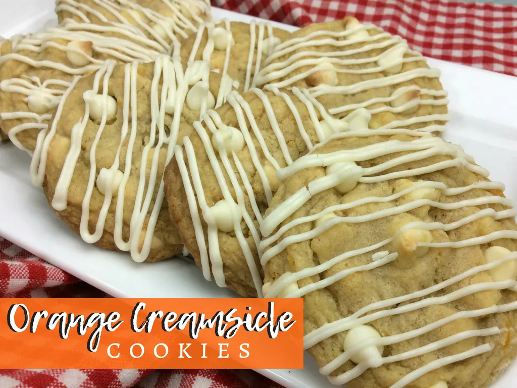 Orange Creamsicle Orange Creamsicle Cookie Recipe - The BEST Summer Cookies EVER! This Orange Creamsicle Cookie Recipe is a delicious twist on a summertime favorite treat!  Whip up a batch of these orange creamsicle cookies and WOW the neighbors with the light and fresh taste that's totally addicting!