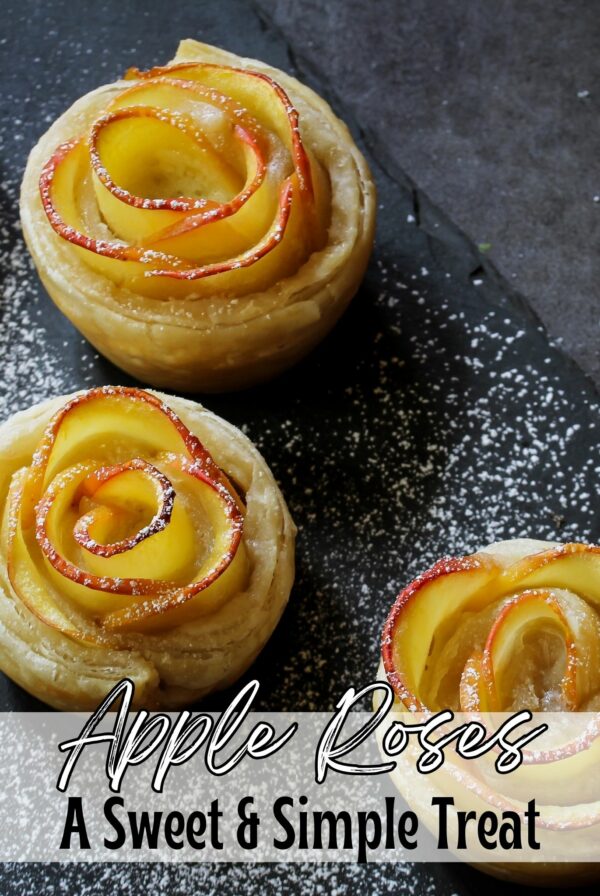 Baked apple roses with powder sugar sprinkled on top.