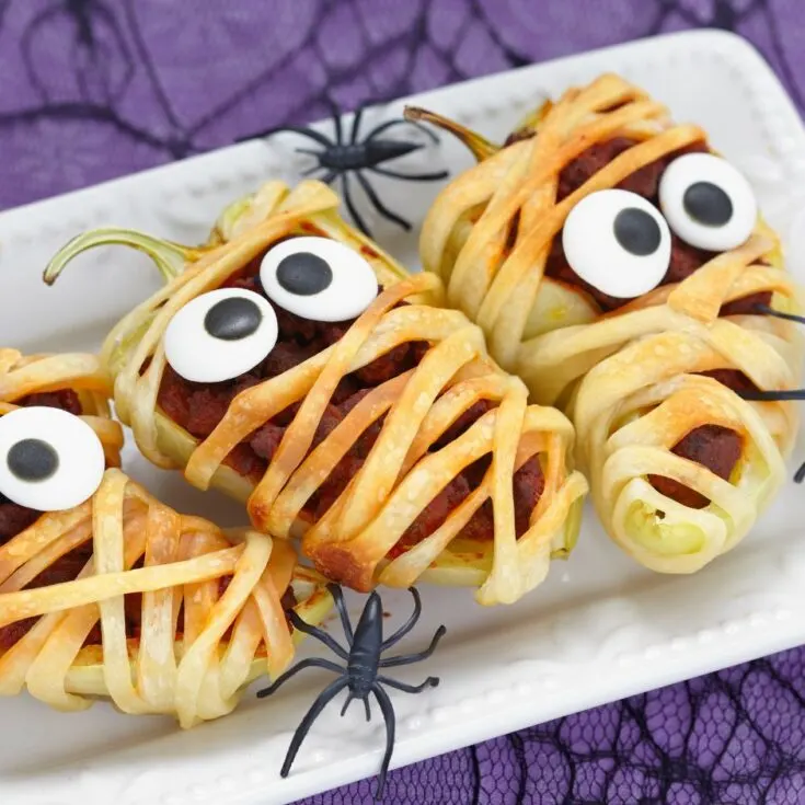 Mummy Stuffed Peppers Recipe Halloween Food Dishes the Kids Will Love These Halloween food dishes the kids will love are a little cute, a little eery, and a whole lot of fun!  Have a fun and yummy holiday with some Halloween food dishes that are perfect for parties, school lunch ideas, or just a frightfully delicious Halloween dinner!